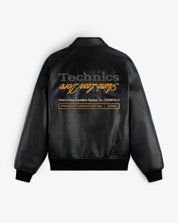 ALD / Technics Varsity Leather Jacket: Black leather with gold script and PRODUCT CERTIFICATE No. 2026 label.
