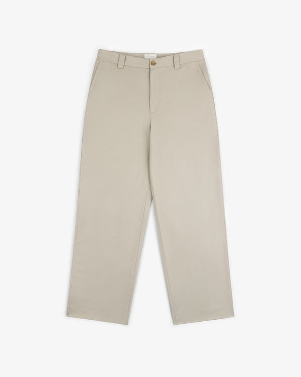 Officer Pant in beige with straight legs, side pockets, button closure, and belt loops on a white background.