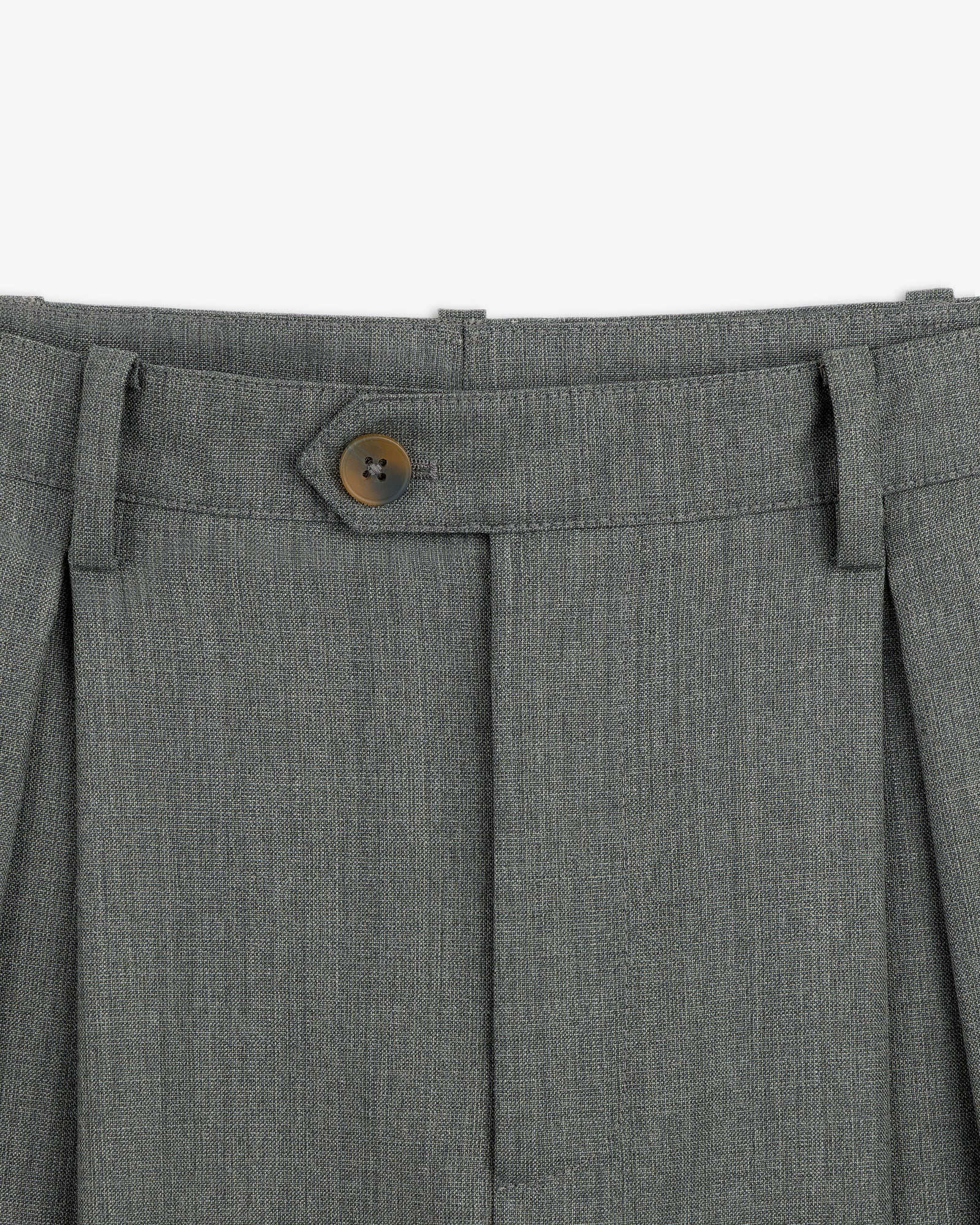 Close-up of the waistband and button on the Lightweight Cuffed Trouser with belt loops and pleats.