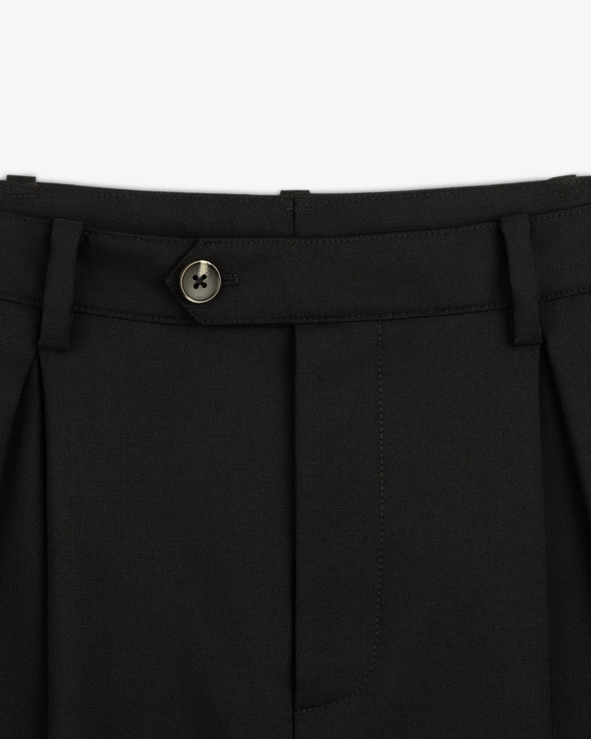 Close-up of the waist and button on the Lightweight Cuffed Trouser with belt loops and front pleats.