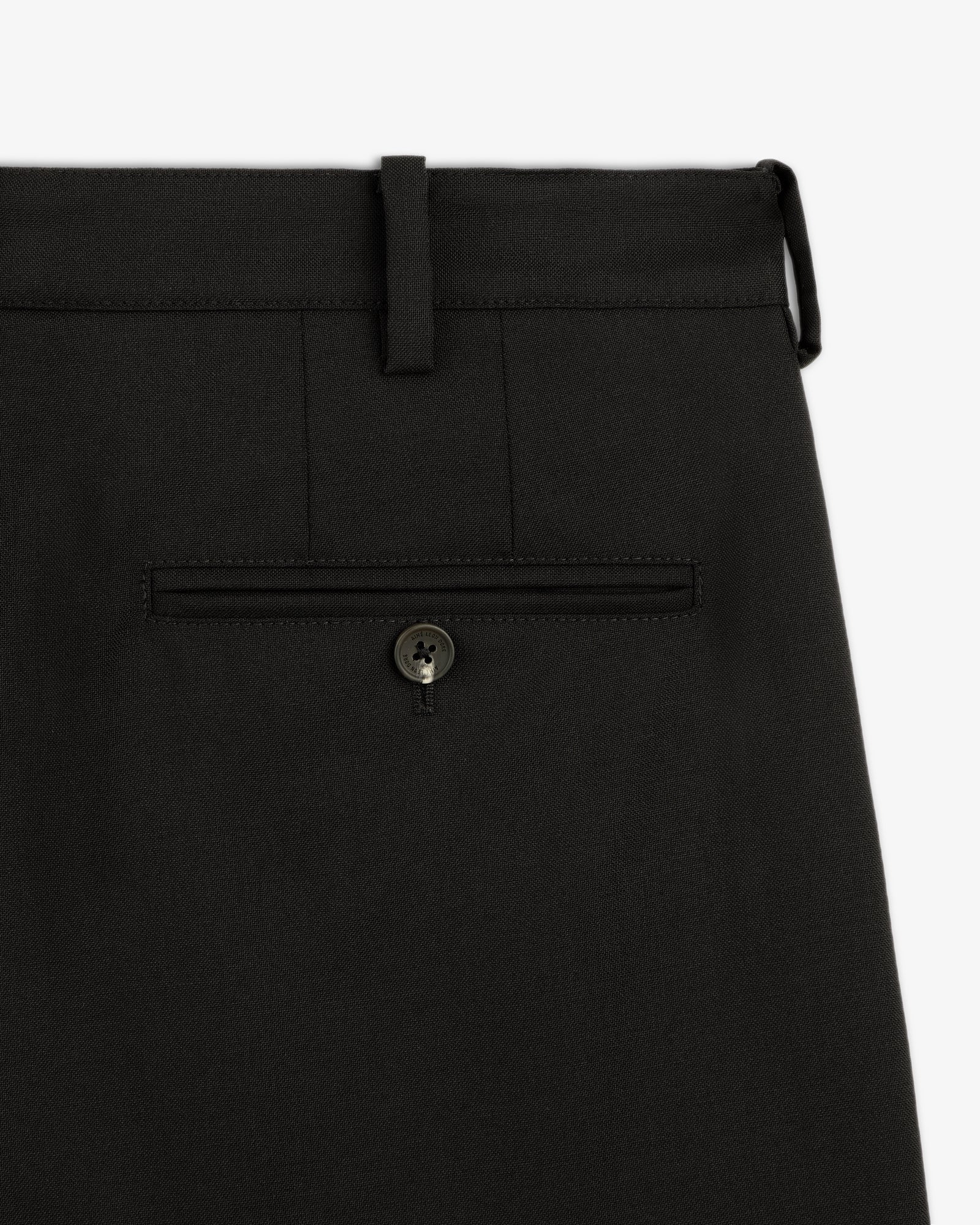Close-up of the back of Lightweight Cuffed Trouser showing a buttoned welt pocket and belt loop.