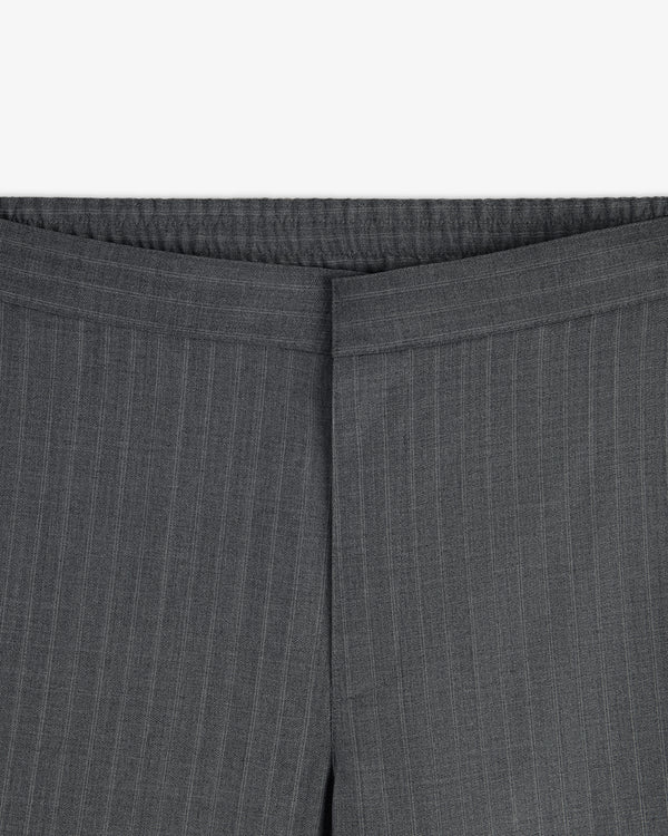 Close-up of the waistband and upper section of Pinstripe Elasticated Waist Trouser, highlighting fabric texture and pattern.