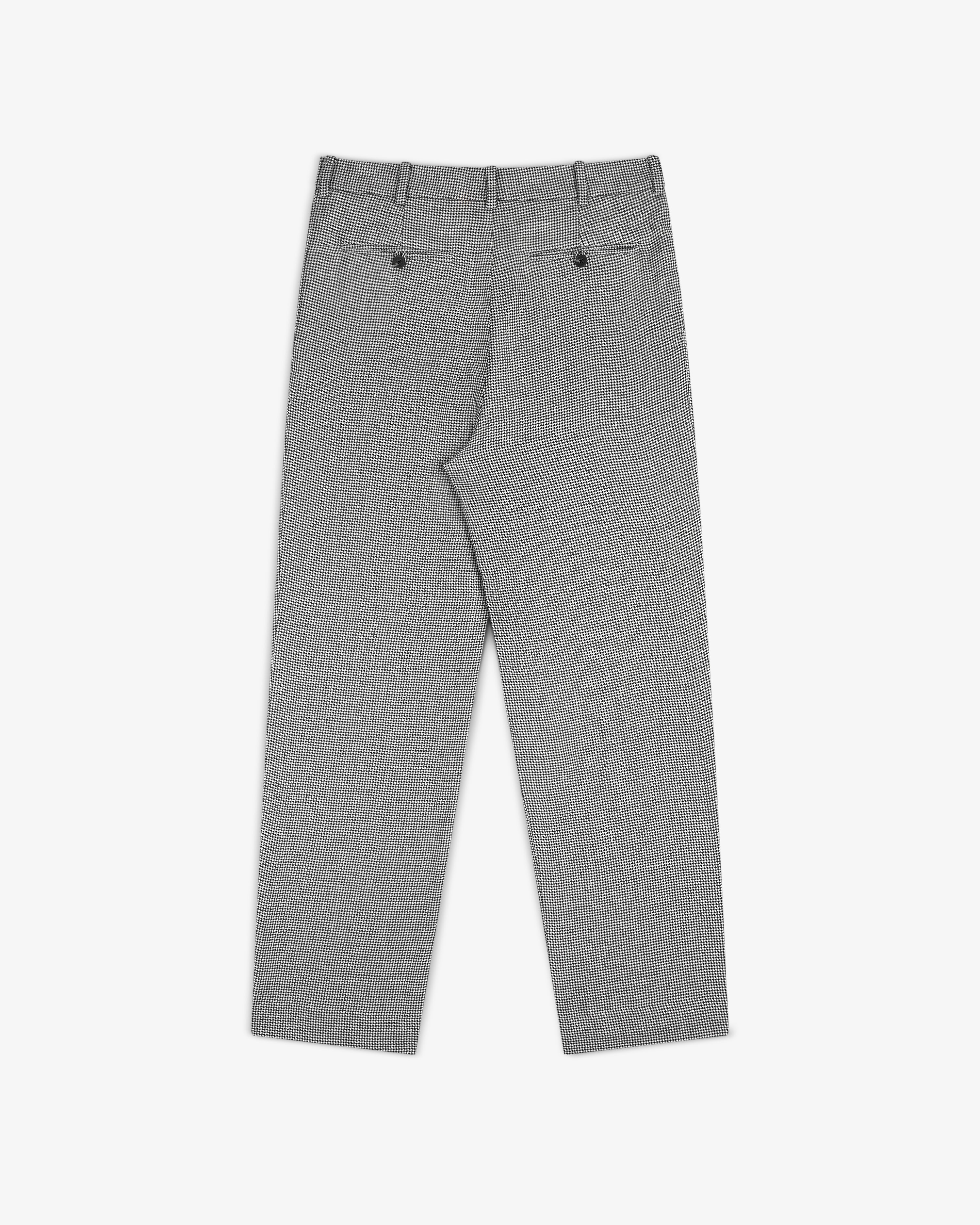 Houndstooth Pleated Trouser, back view, with belt loops and two buttoned pockets, laid flat on white background.