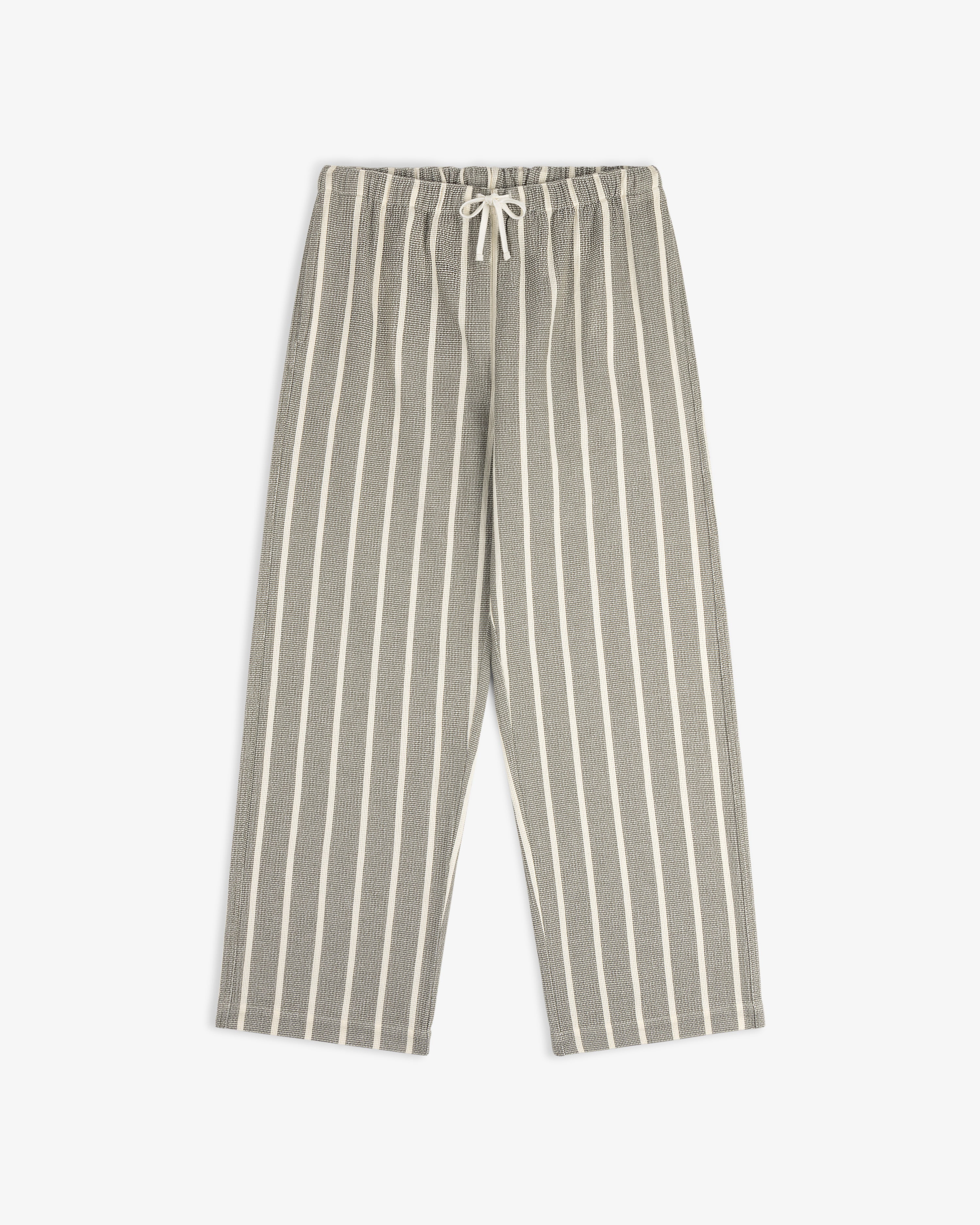 Wide Leg Shore Pant in gray and white vertical stripes with elastic waistband and drawstring, laid flat on white.