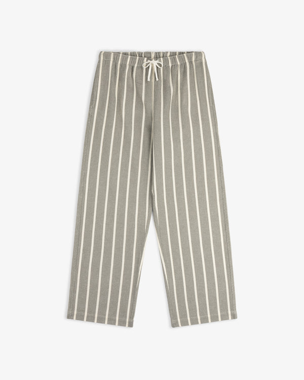 Wide Leg Shore Pant in gray and white vertical stripes with elastic waistband and drawstring, laid flat on white.