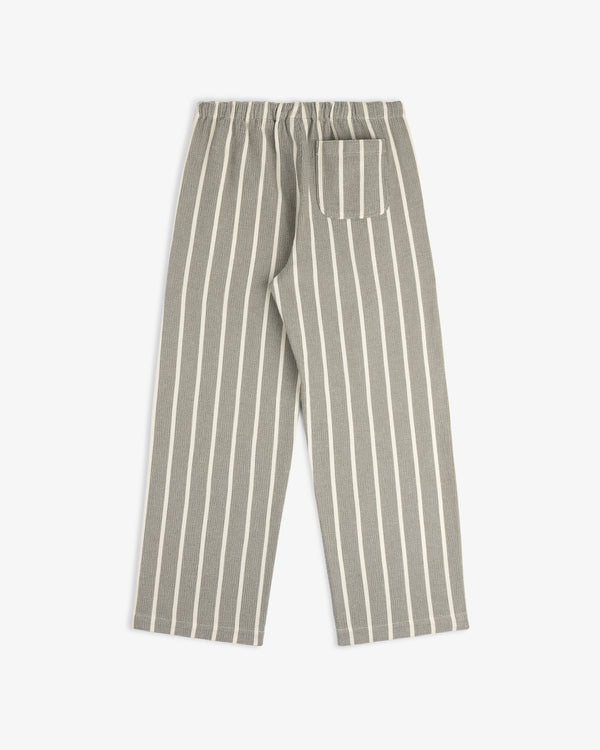Wide Leg Shore Pant in gray with white vertical stripes, elastic waistband, and a single back pocket laid flat.