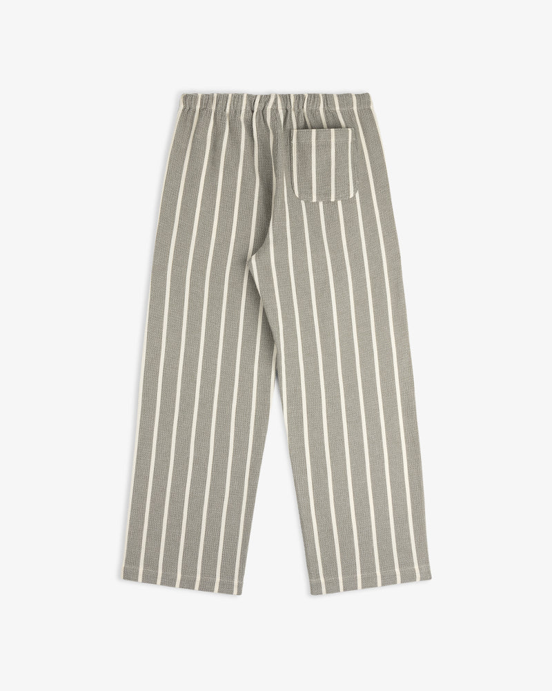 Wide Leg Shore Pant in gray with white vertical stripes, elastic waistband, and a single back pocket laid flat.