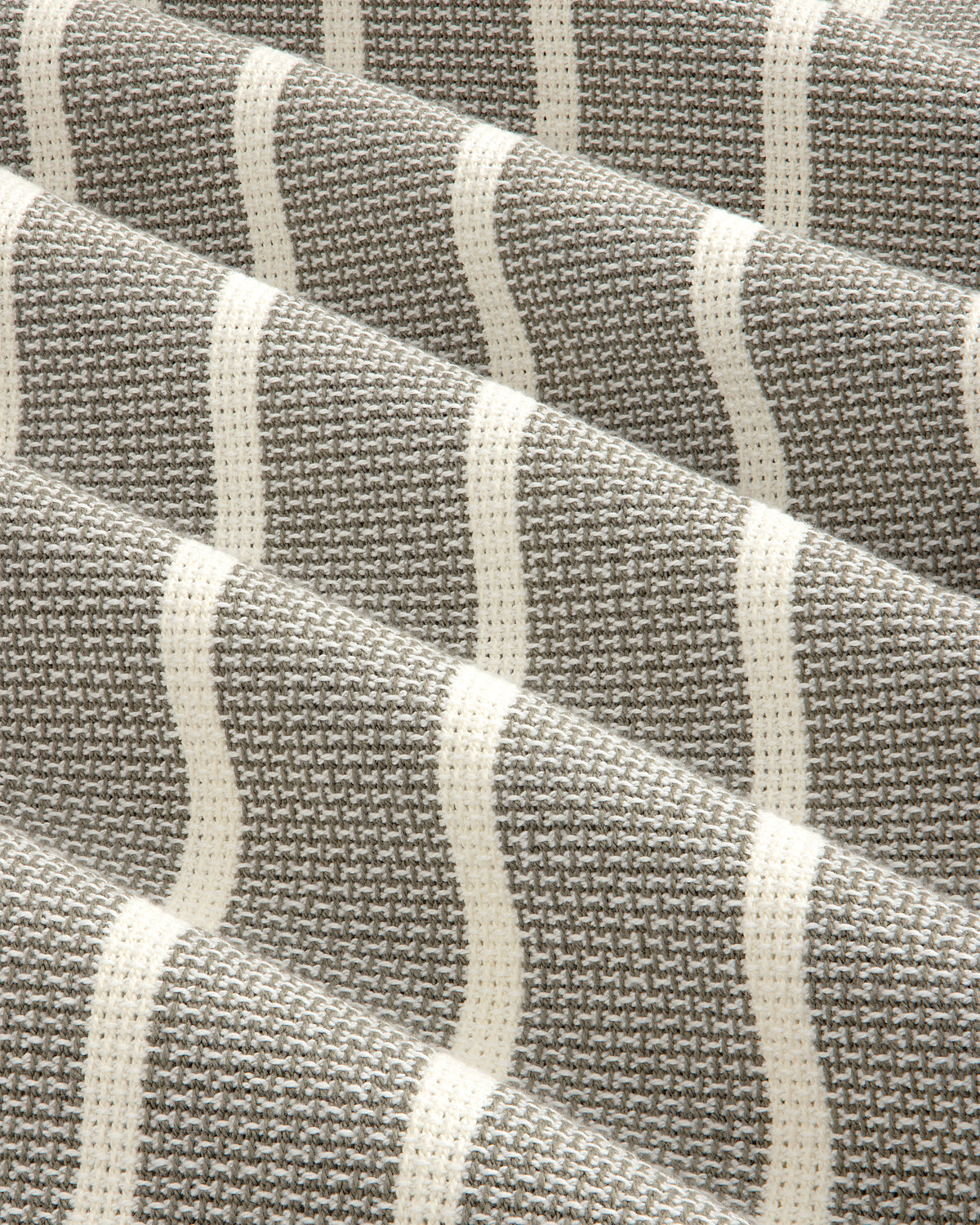 Close-up of Wide Leg Shore Pant in textured gray fabric with repeating white horizontal stripes.