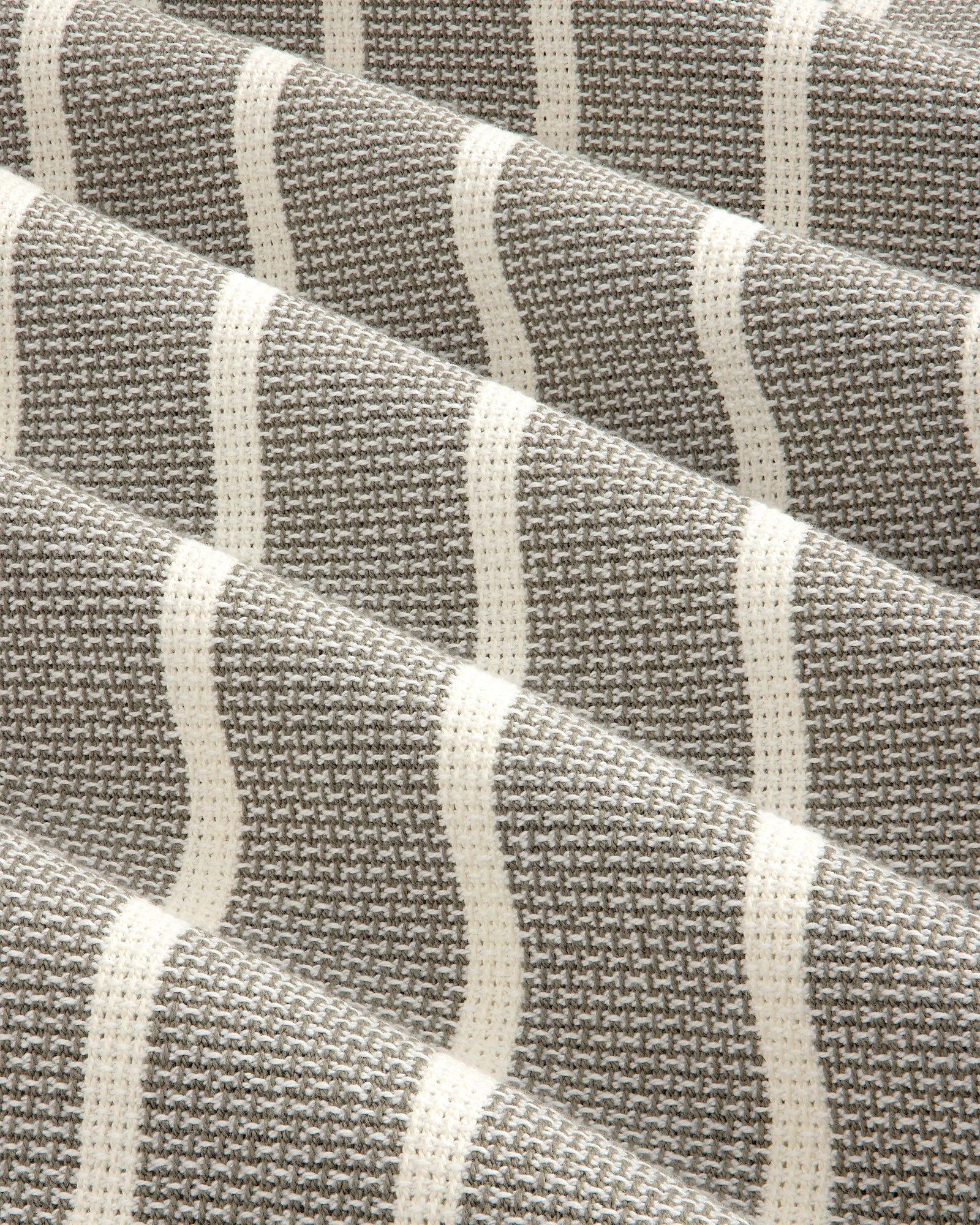 Close-up of Wide Leg Shore Pant in textured gray fabric with repeating white horizontal stripes.