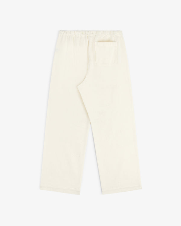 Off-white Wide Leg Shore Pant with elastic waistband and single back pocket, laid flat on a white background.