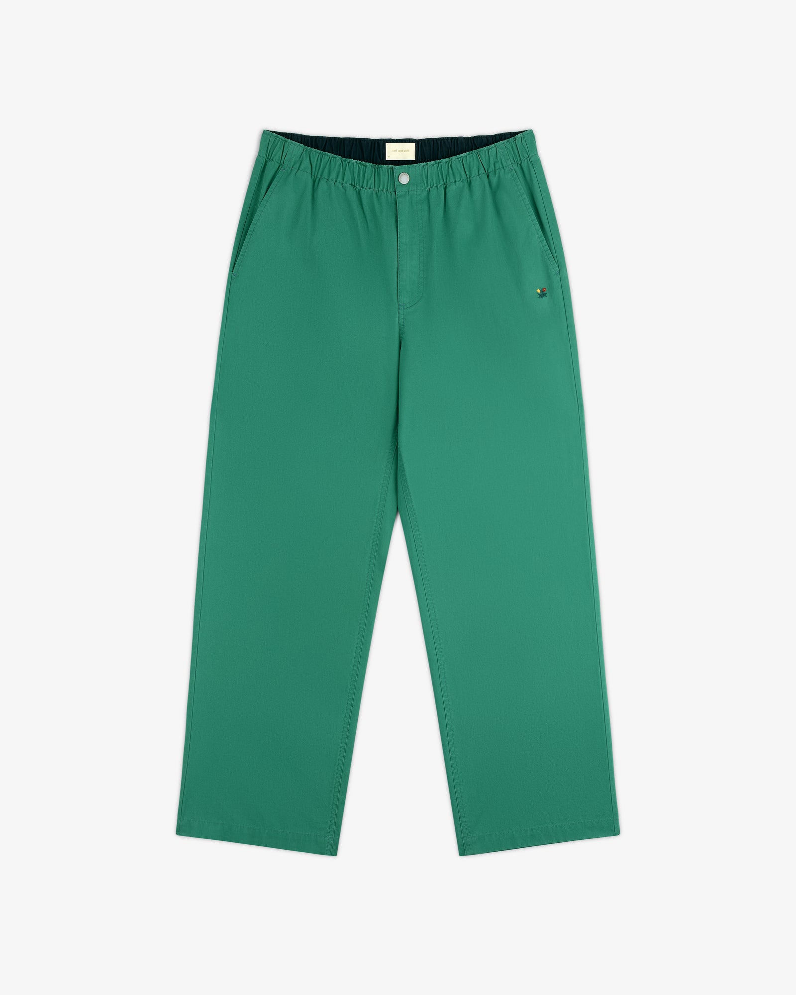 Washed Cotton Windbreaker Pant, green with elastic waistband and side pockets, shown flat on a white background.