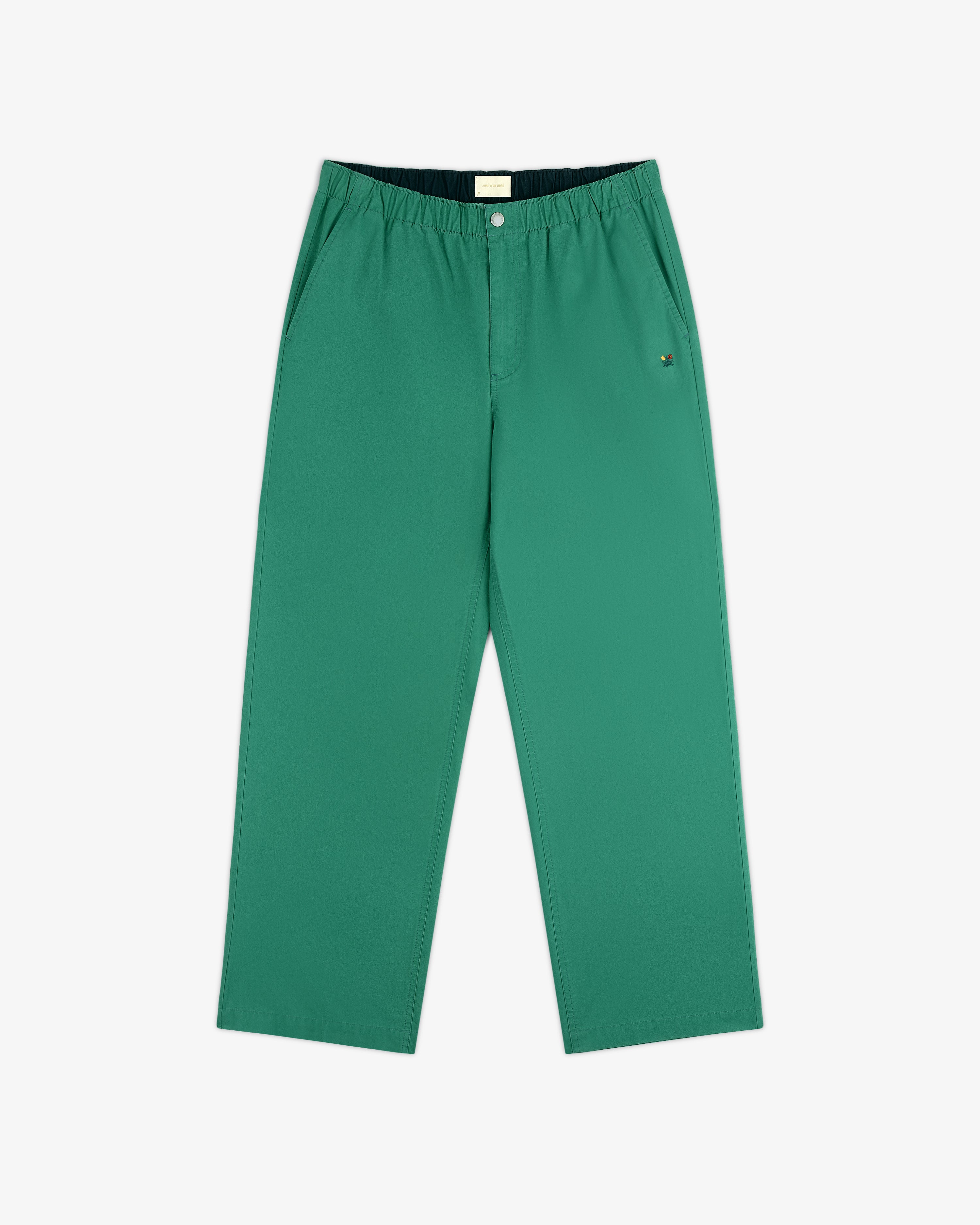 Washed Cotton Windbreaker Pant, green with elastic waistband and side pockets, shown flat on a white background.