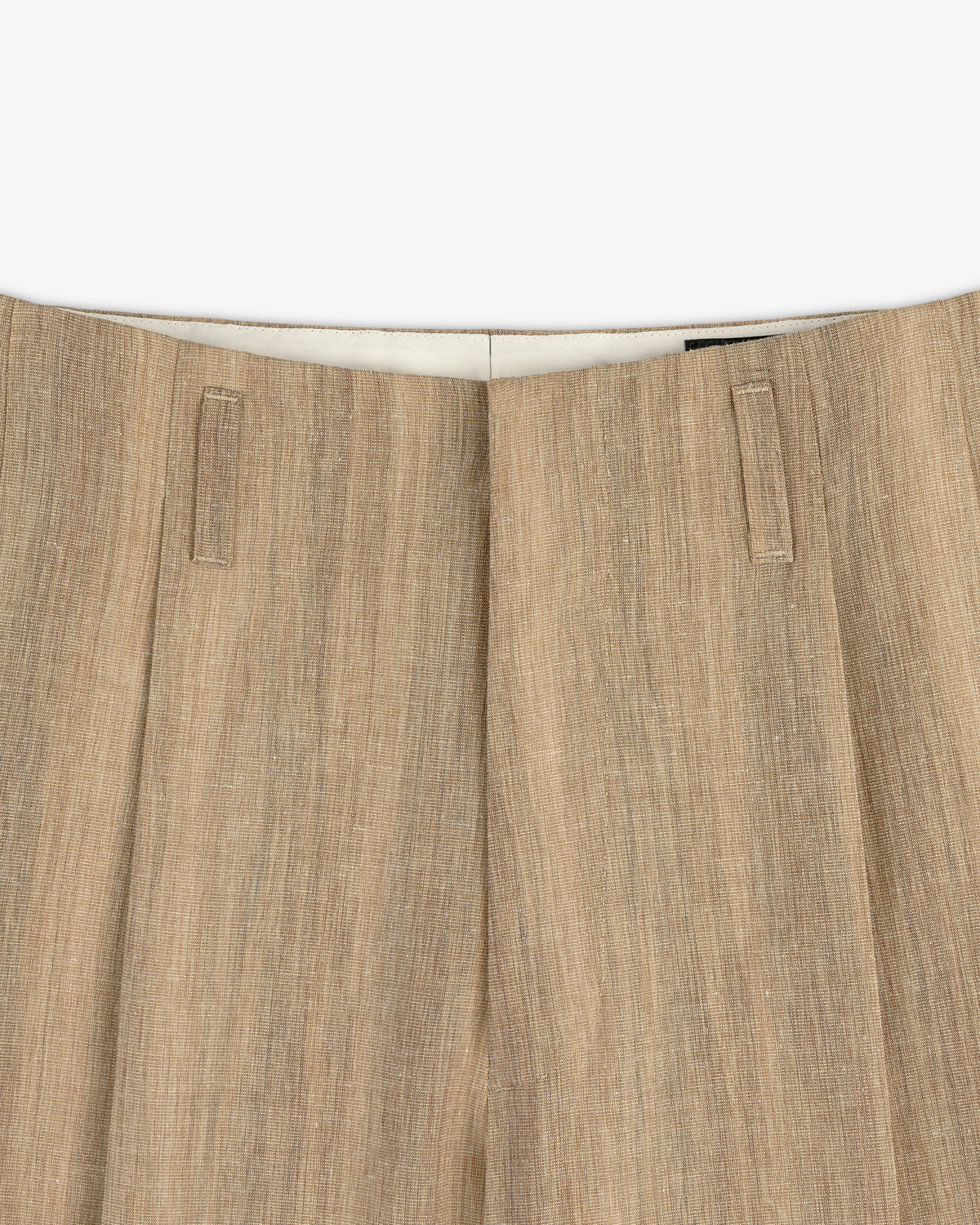 Close-up of the waistband and upper section of Double Pleated Safari Suit Trouser with belt loops.