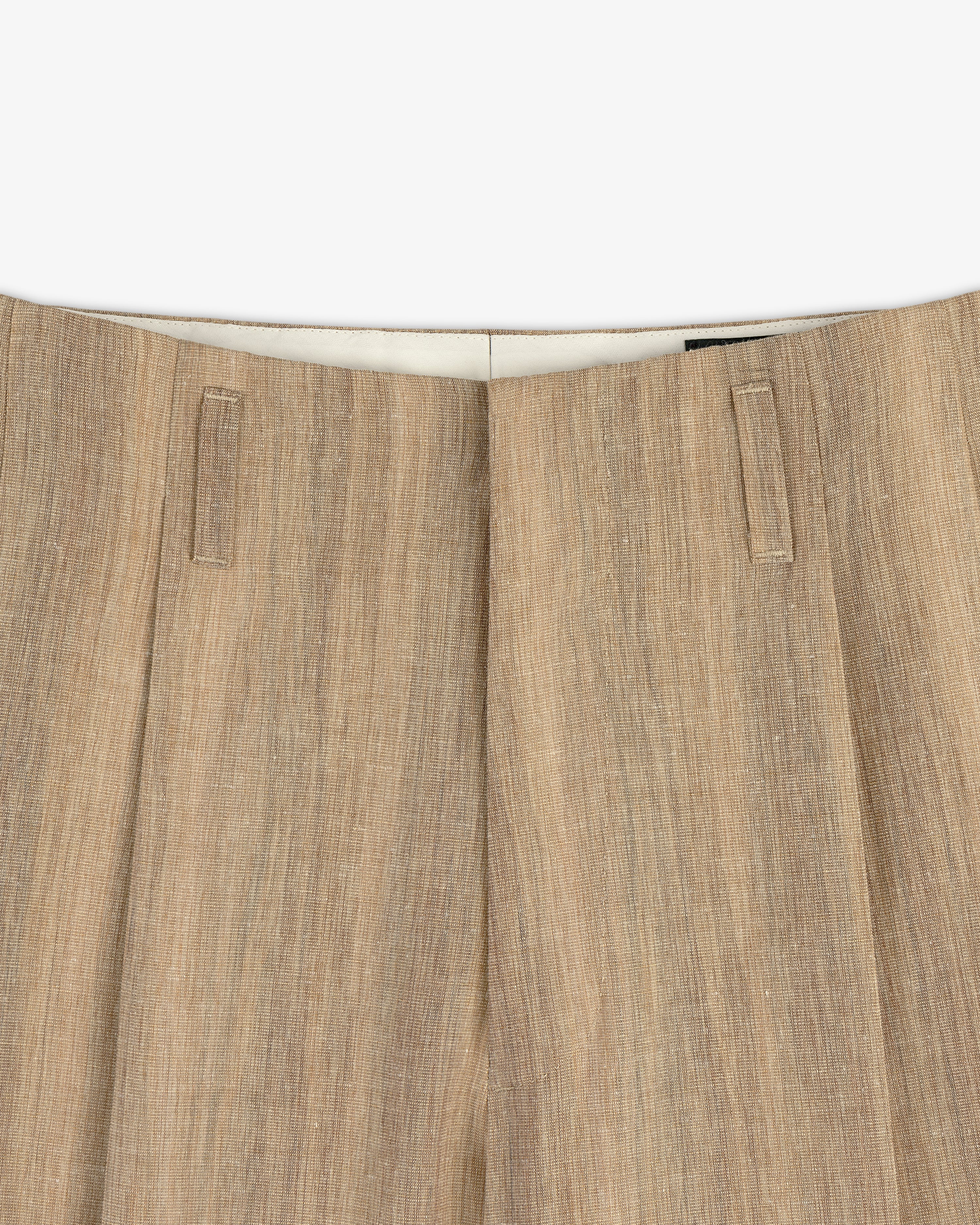 Close-up of the waistband and upper section of Double Pleated Safari Suit Trouser with belt loops.