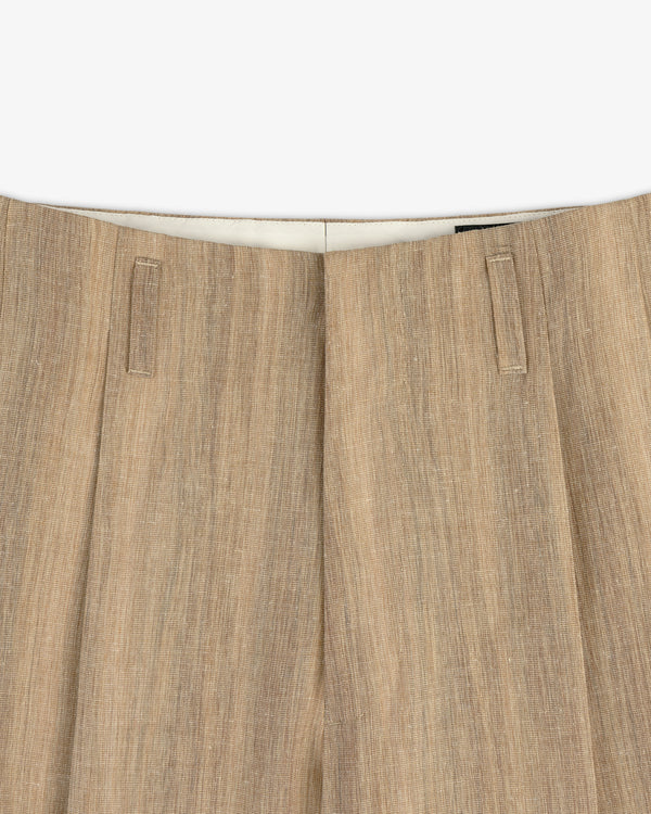 Close-up of the waistband and upper section of Double Pleated Safari Suit Trouser with belt loops.