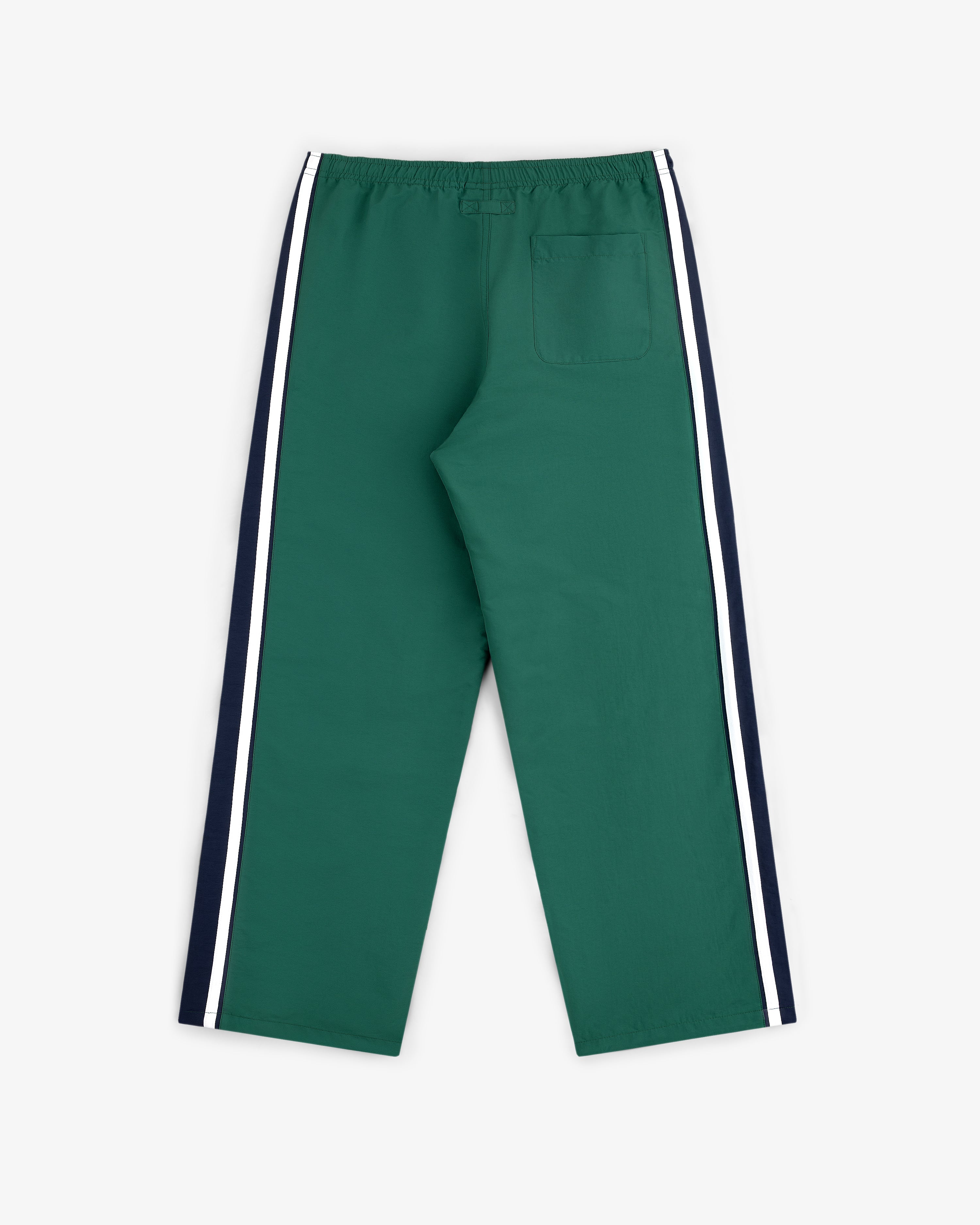 Colorblock Track Pant: green with navy and white side stripes, elastic waistband, single back pocket, shown flat on white.
