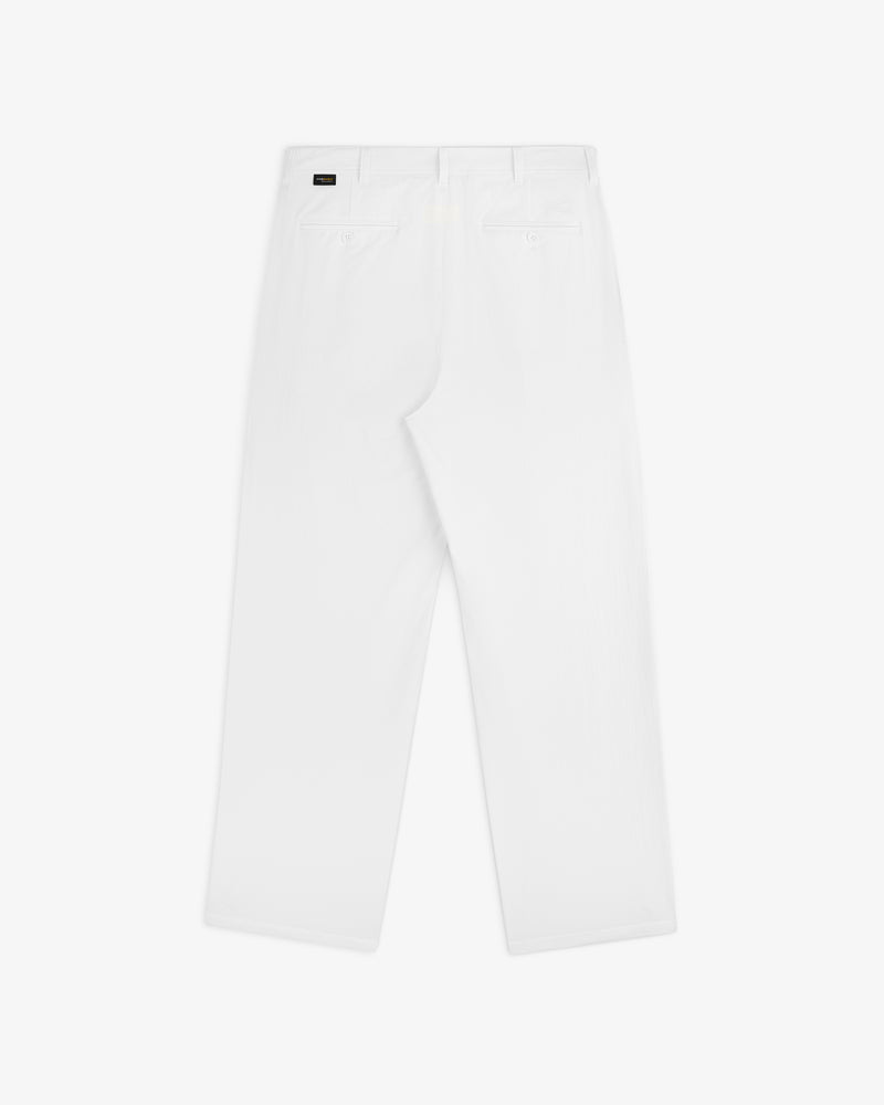 Back view of ALD Golf Cordura Double Pleated Pant in white, showing two rear pockets and belt loops, laid flat.