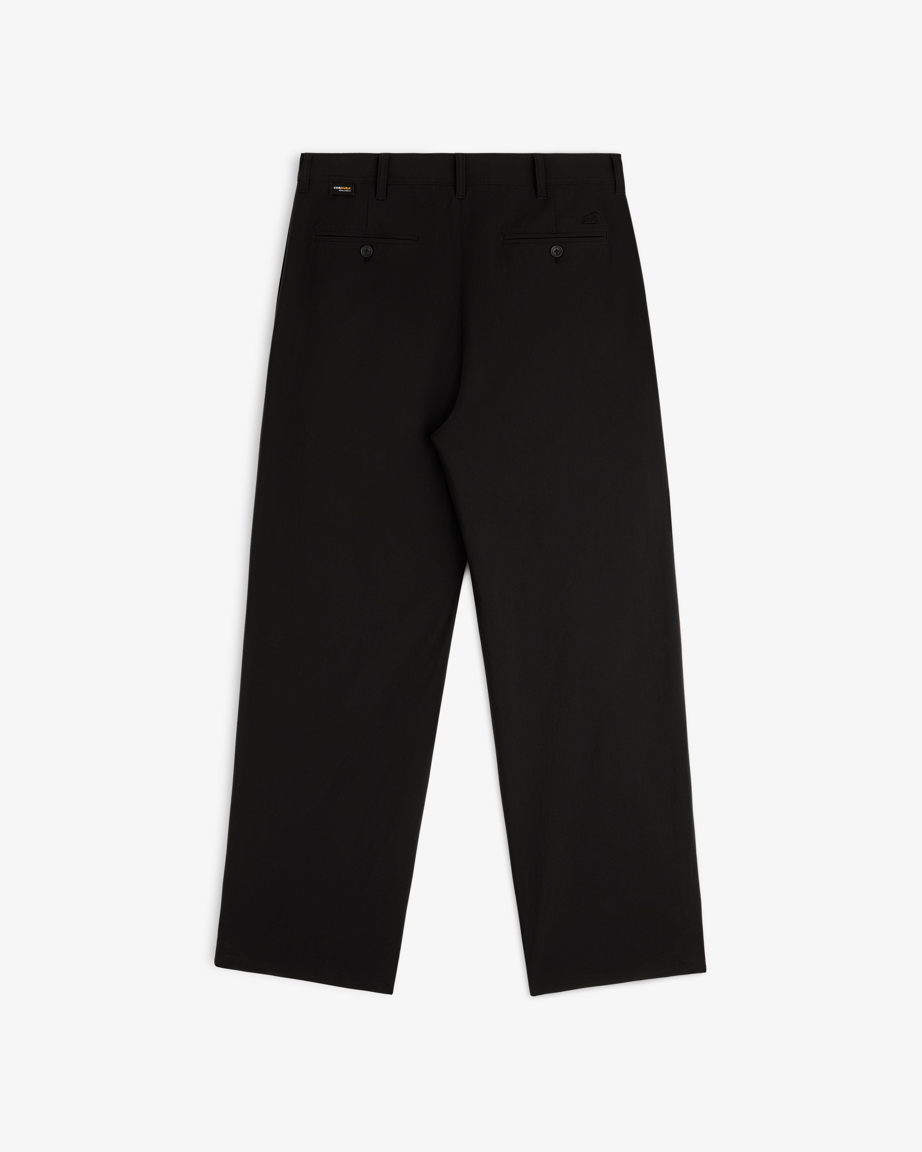 ALD Golf Cordura Double Pleated Pant shown flat from the back with two buttoned pockets and belt loops.