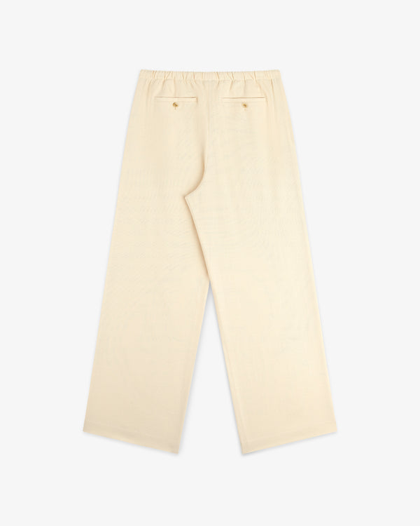 Drawstring Cotton Blend Suit Trouser in beige with wide legs, elastic waist, and two back pockets shown on white.