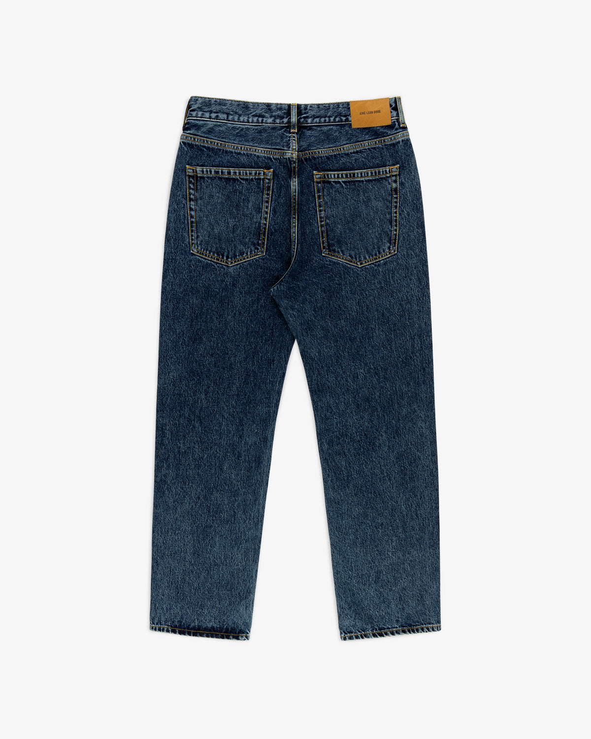 Back view of Relaxed Fit 5-Pocket Denim Pant in blue with two back pockets and a brown leather patch on the waistband.