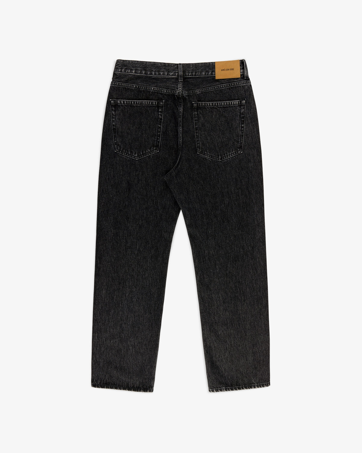 Back view of Relaxed Fit 5-Pocket Denim Pant in black with two back pockets and a tan leather waistband patch.
