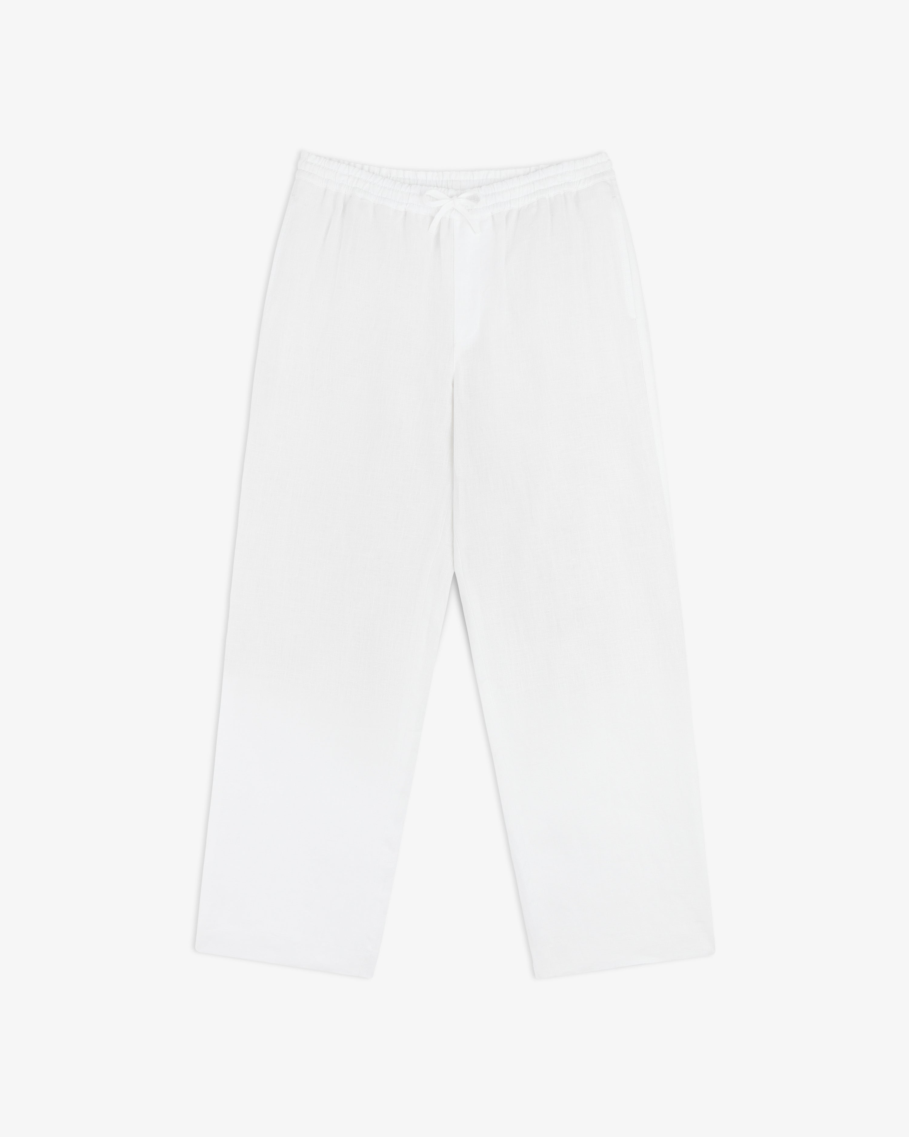 Linen Leisure Pant: white, loose-fitting with elastic waistband and drawstring, shown flat on white background.