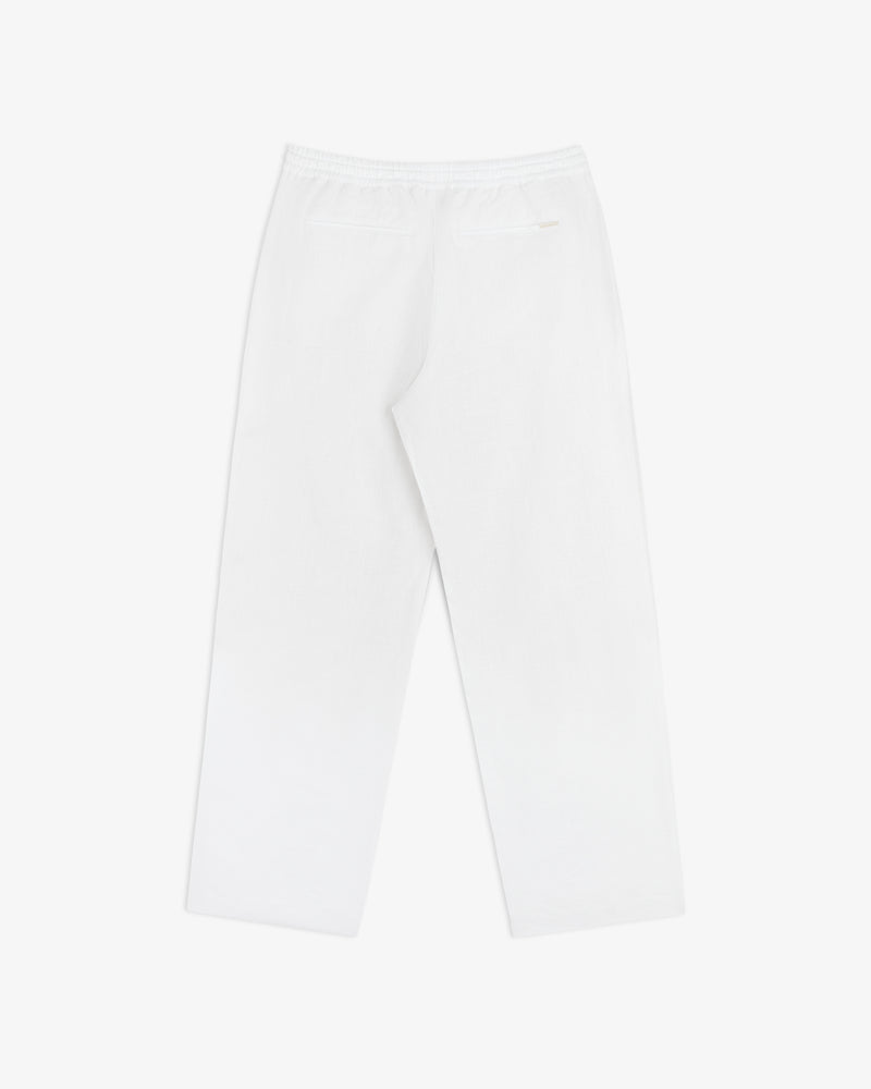 Linen Leisure Pant in white with straight legs, elastic waistband, and one back pocket on a white background.