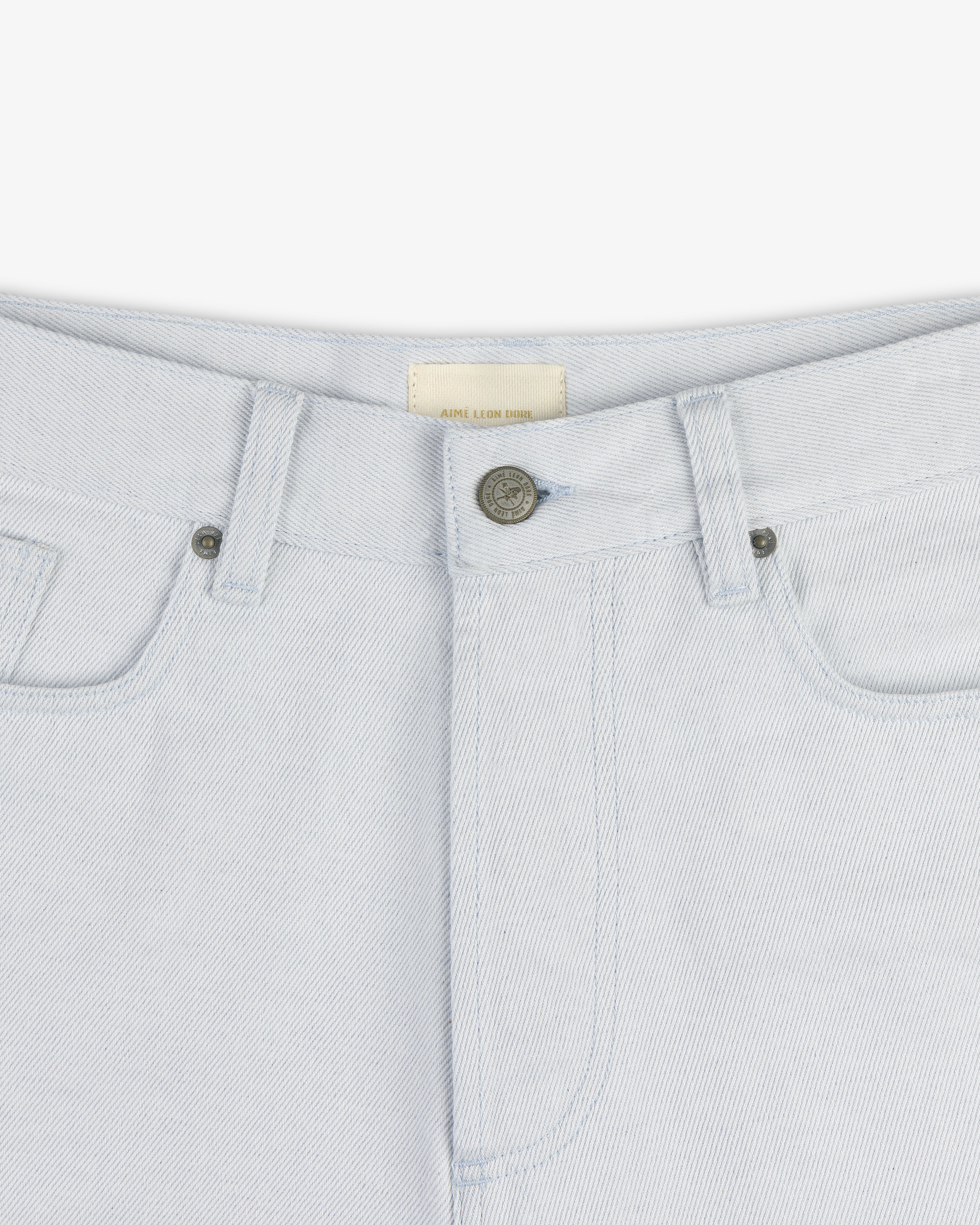 Close-up of the waistband and front button of Light Wash Denim Short with belt loops and pockets.