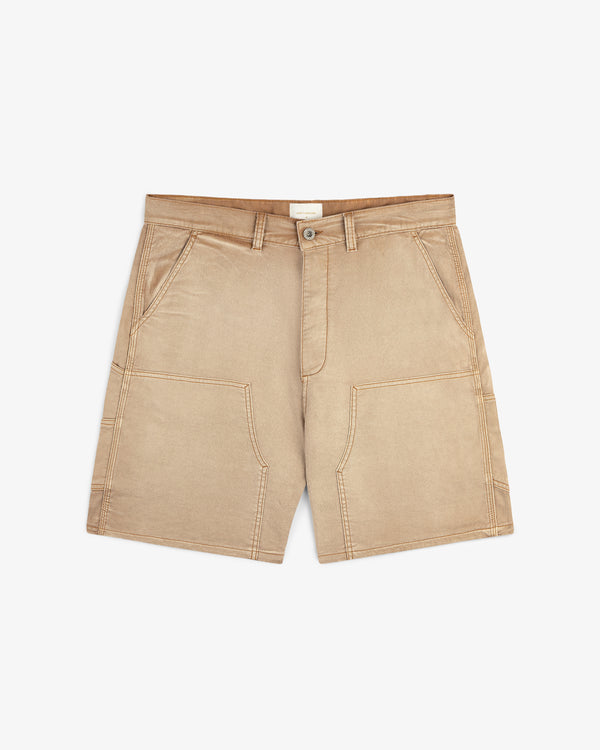 Garment Dyed Carpenter Short in beige with front pockets and button closure, shown on a white background.