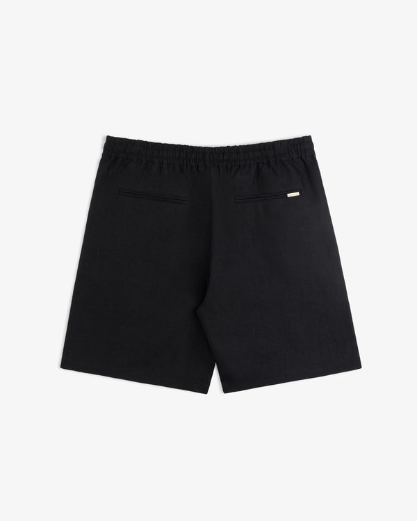 Linen Leisure Short featuring an elastic waistband and two back welt pockets, shown on a white background.