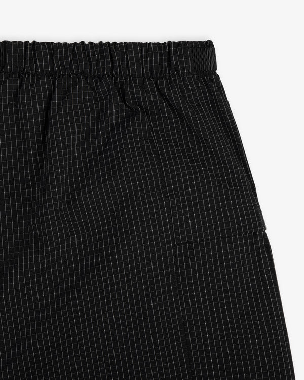 Close-up of Ripstop Nylon Wave Short with an elastic waistband and a subtle white grid pattern.