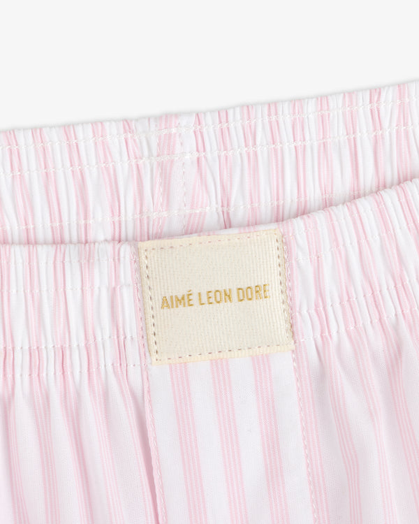 Close-up of Striped Boxer Short in pink and white with an AIMÉ LEON DORE label near the waistband.