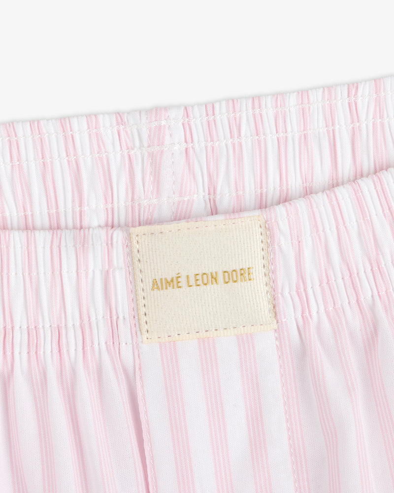Close-up of Striped Boxer Short in pink and white with an AIMÉ LEON DORE label near the waistband.