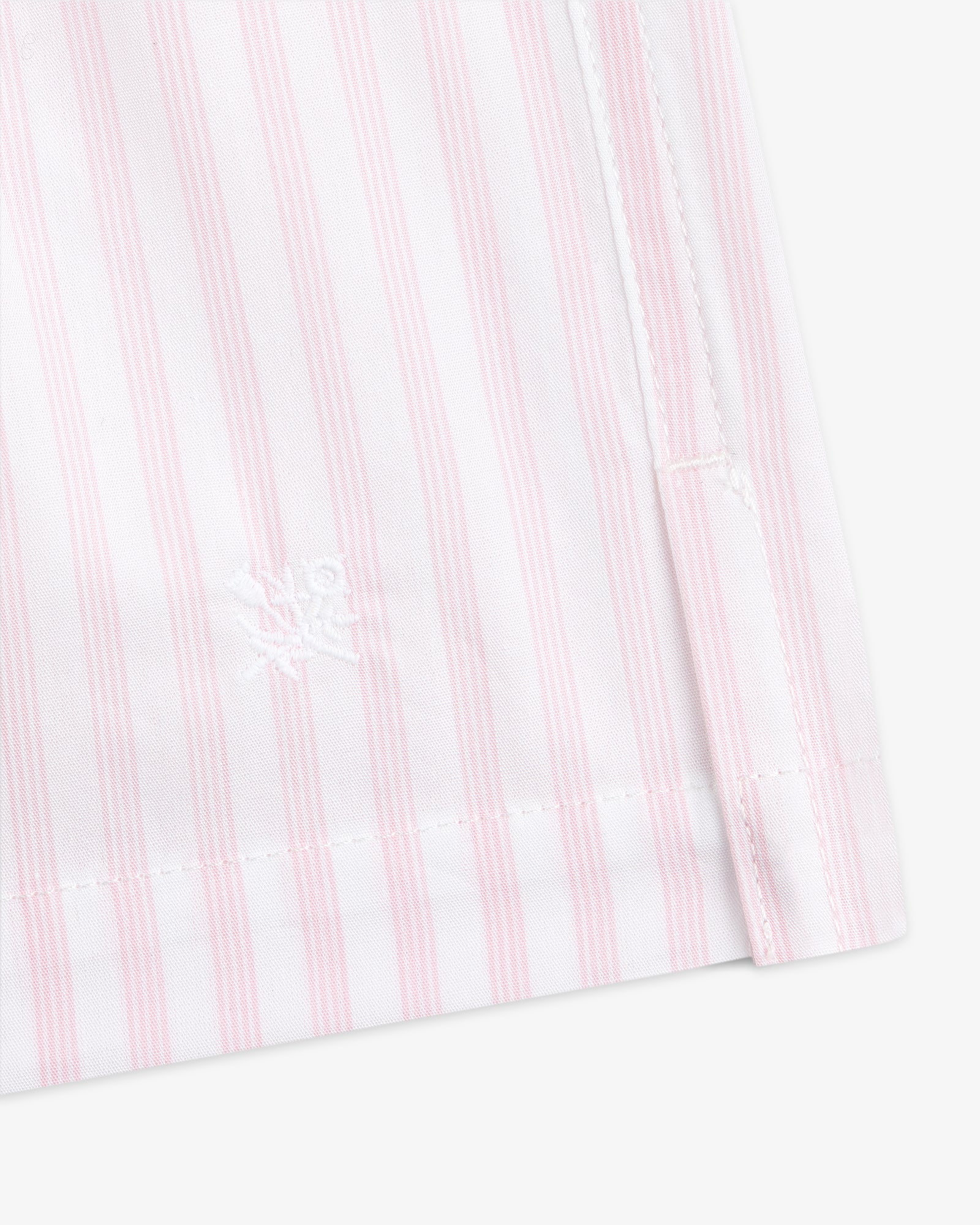 Close-up of Striped Boxer Short in pink and white with white embroidered logo near the hem and visible stitching.