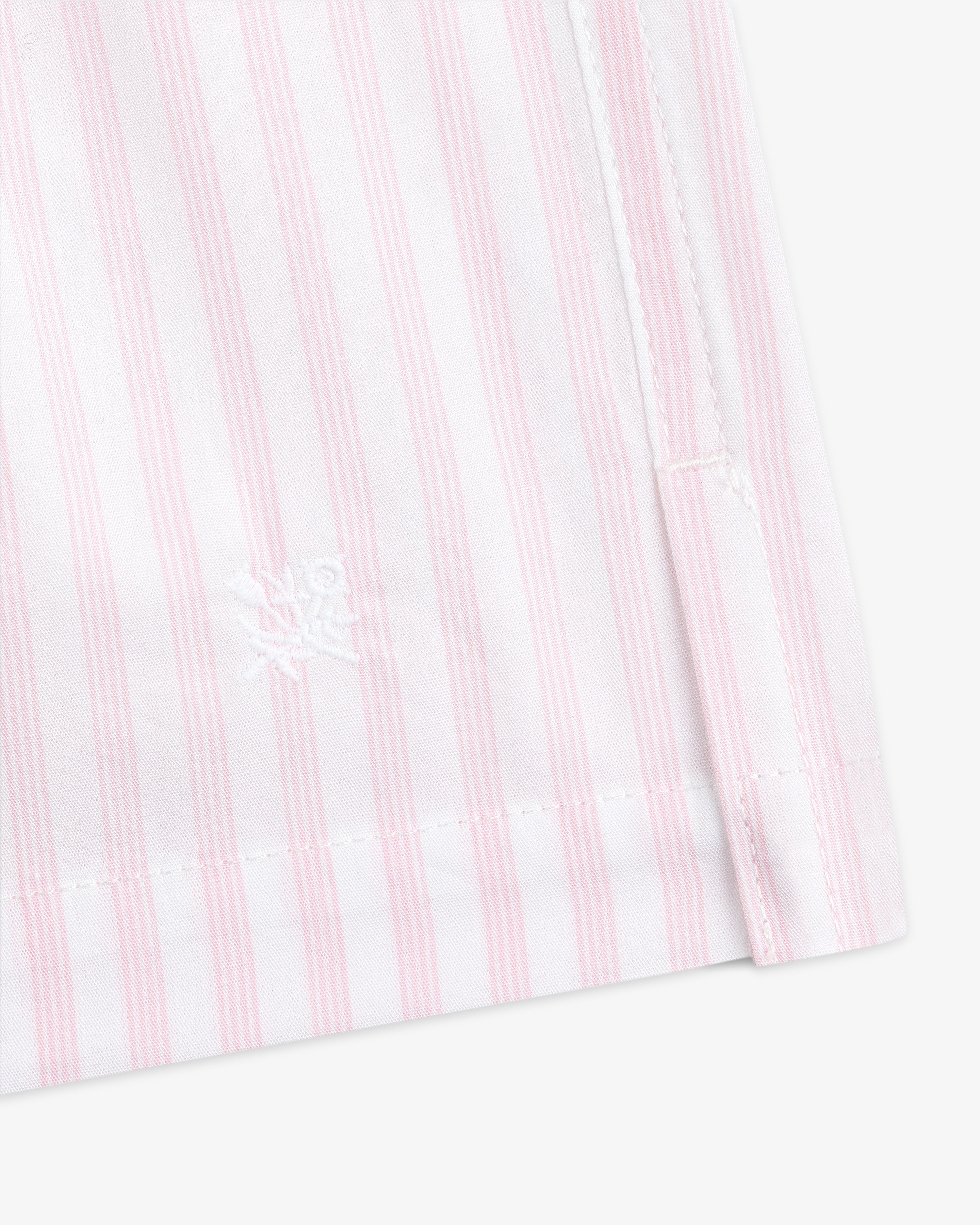 Close-up of Striped Boxer Short in pink and white with white embroidered logo near the hem and visible stitching.