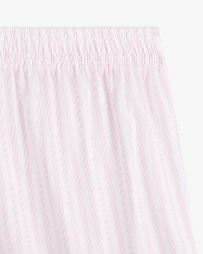 Close-up of the Striped Boxer Short featuring light pink and white vertical stripes and an elastic waistband.