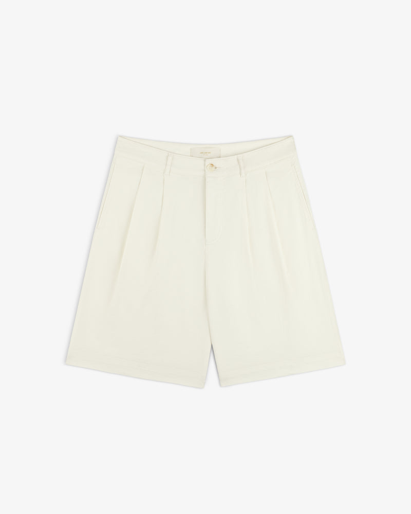 Cream Pleated Linen Blend Bermuda Shorts with slanted side pockets and button closure, shown on a white background.