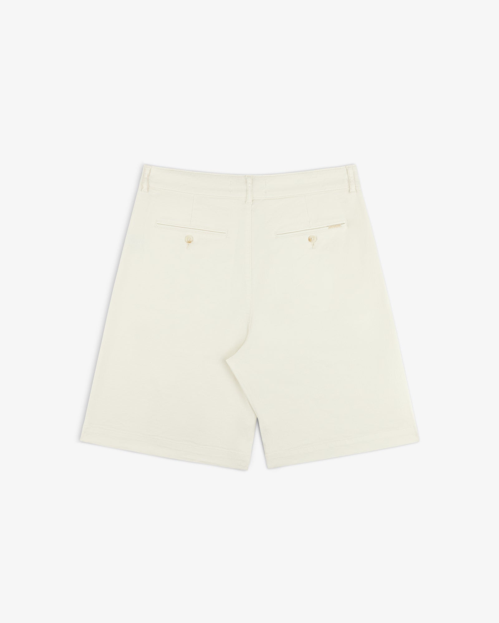 Back of Pleated Linen Blend Bermuda Short in cream, with two buttoned back pockets, shown on a white background.