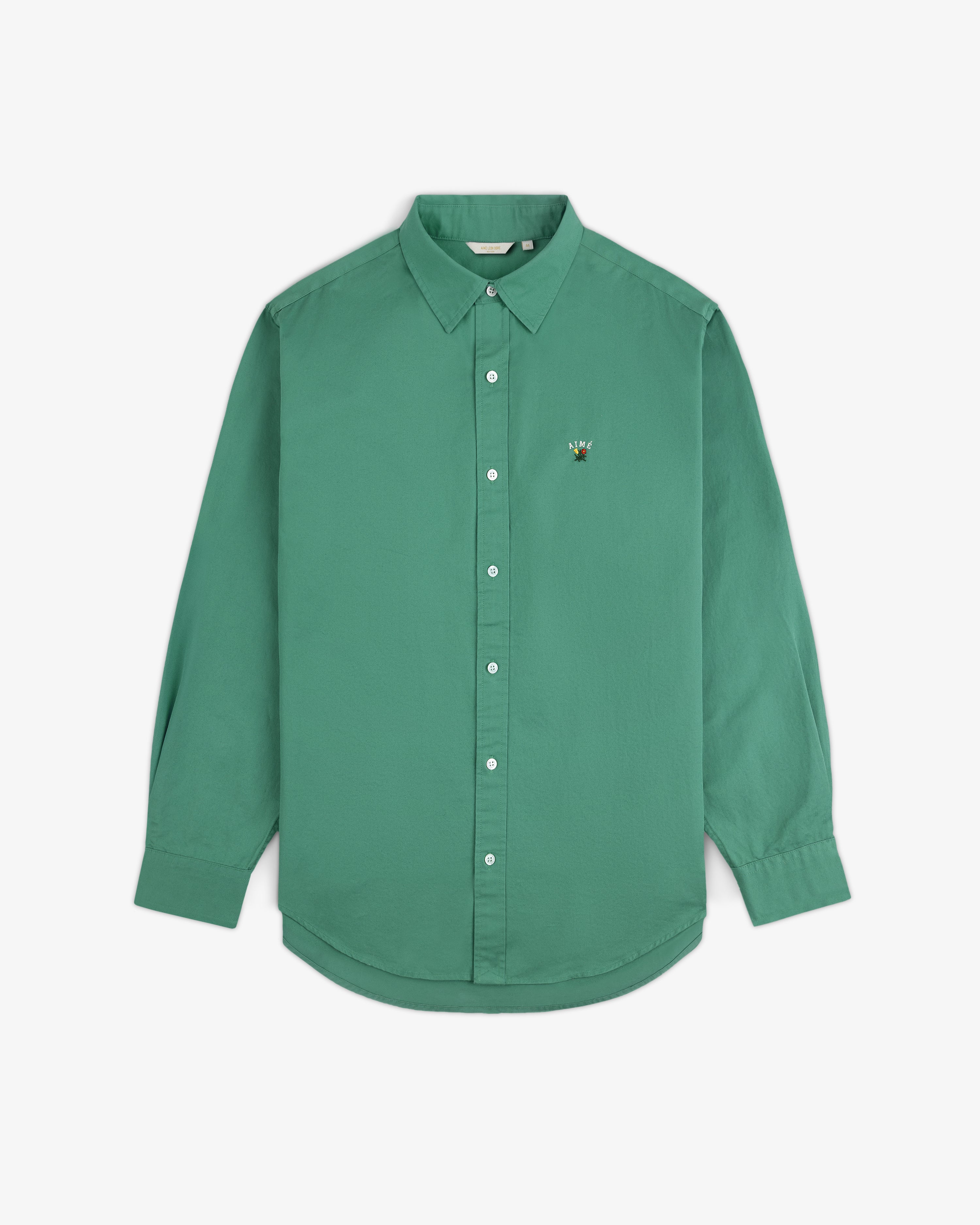 Leon Overshirt: Green long-sleeve button-up with a small embroidered bee logo on the left chest.