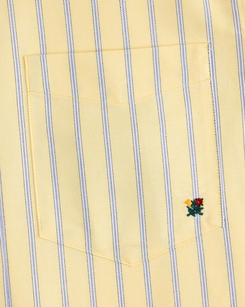 Yarn Dyed Striped Crest Shirt: yellow with thin blue stripes and a small red and yellow flower by the pocket.