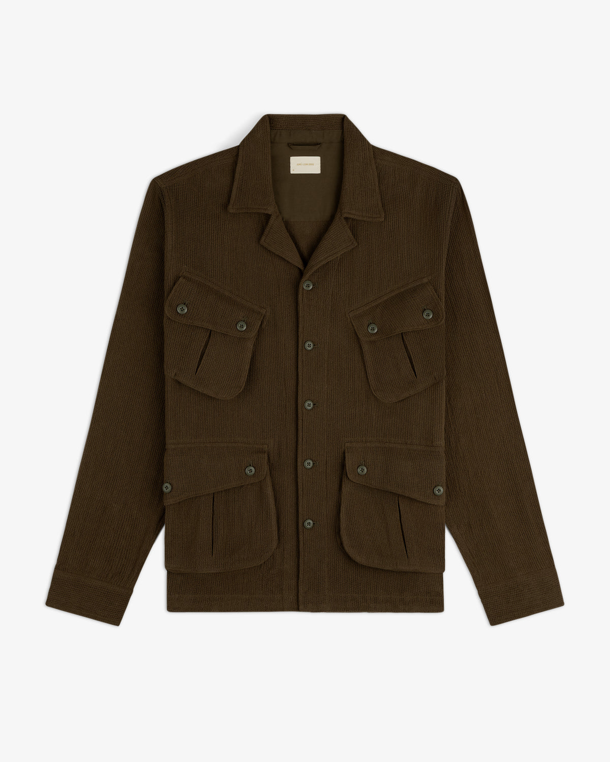 Mesh Jungle Shirt in dark brown, button-up, with four front flap pockets, displayed on a white background.