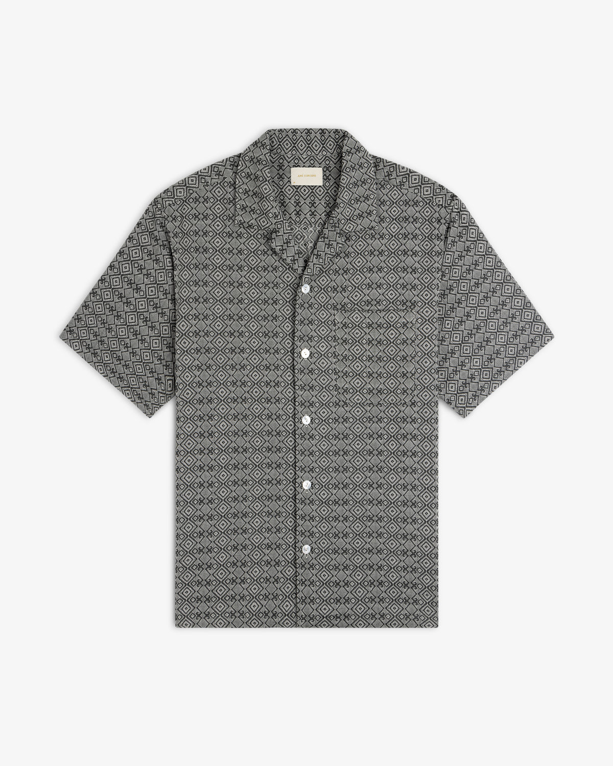Jacquard Leisure Shirt with short sleeves and a black and white geometric diamond pattern, laid flat on white.