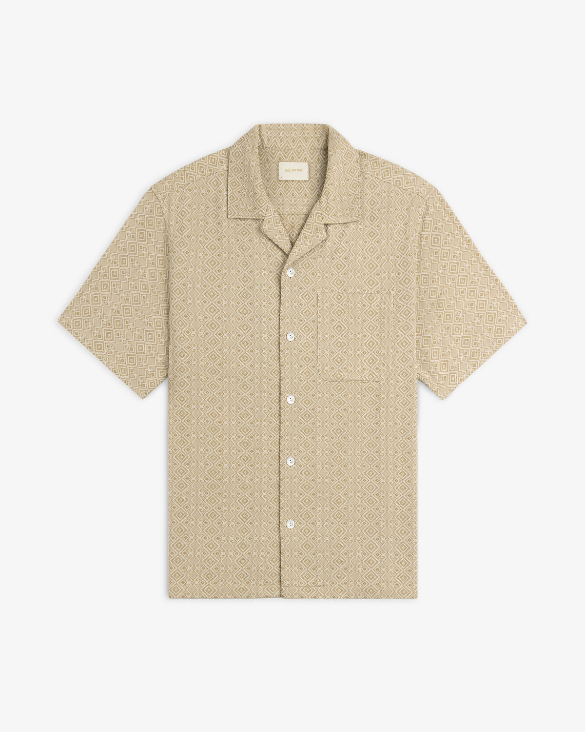 Jacquard Leisure Shirt: beige short-sleeve button-up with geometric diamond pattern and chest pocket, on white background.