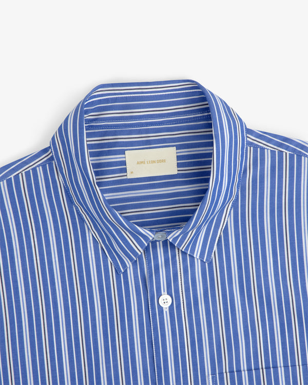 Yarn Dyed Striped Shirt with white vertical stripes and folded collar, shown chest up on a white background.