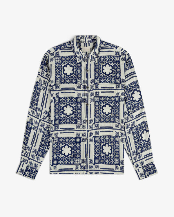 Mosaic Button Down Shirt with blue and white geometric floral tile pattern, laid flat on a white background.