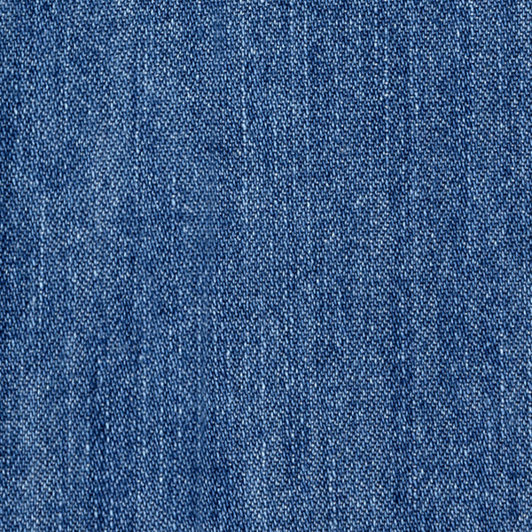 Close-up of Crest Chambray Shirt's blue denim, highlighting its detailed woven texture and gentle fading.