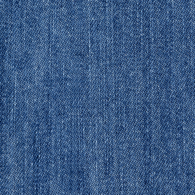 Close-up of Crest Chambray Shirt's blue denim, highlighting its detailed woven texture and gentle fading.
