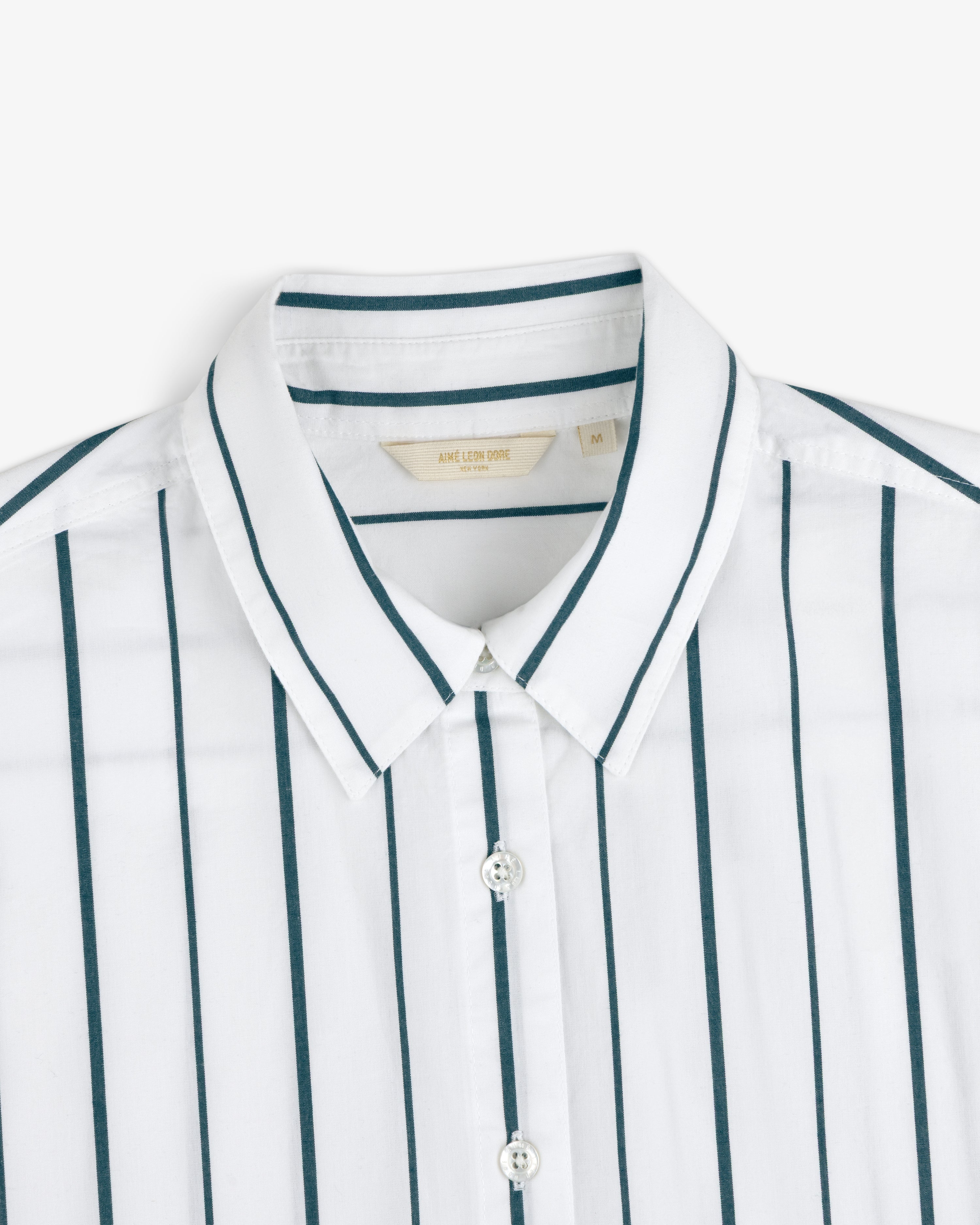 Cropped Poplin Leisure Shirt with dark vertical stripes, buttoned up, shown from chest up on a white background.