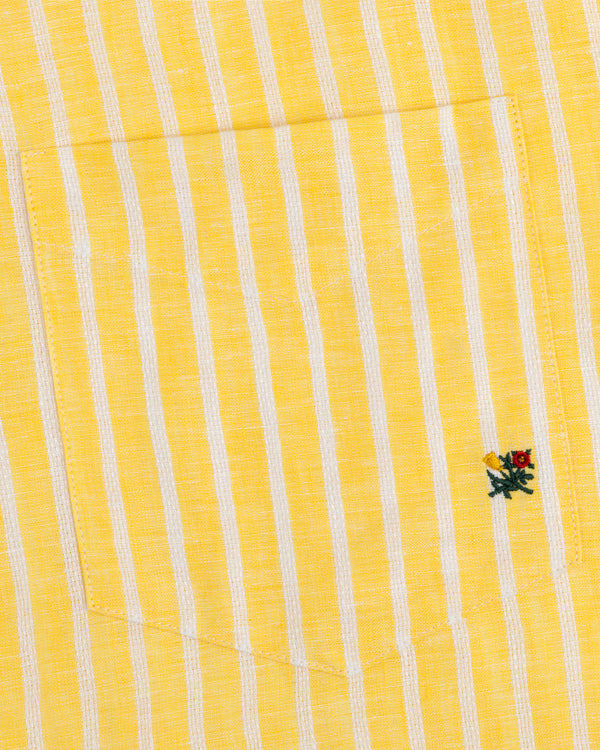 Striped Linen Casual Shirt with yellow and white stripes, pocket, and small embroidered flower near the pocket edge.