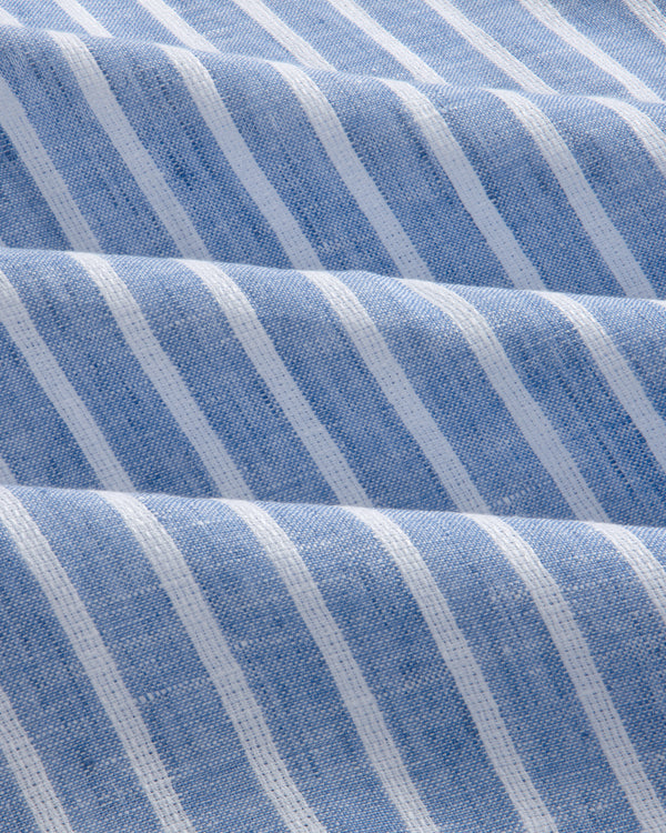 Close-up of the Striped Linen Casual Shirt in light blue, featuring vertical white stripes and a textured surface.